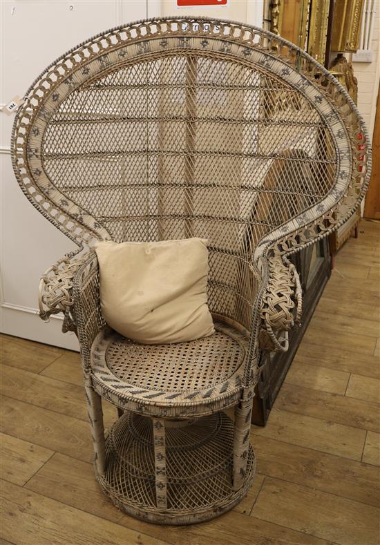 A wicker peacock chair